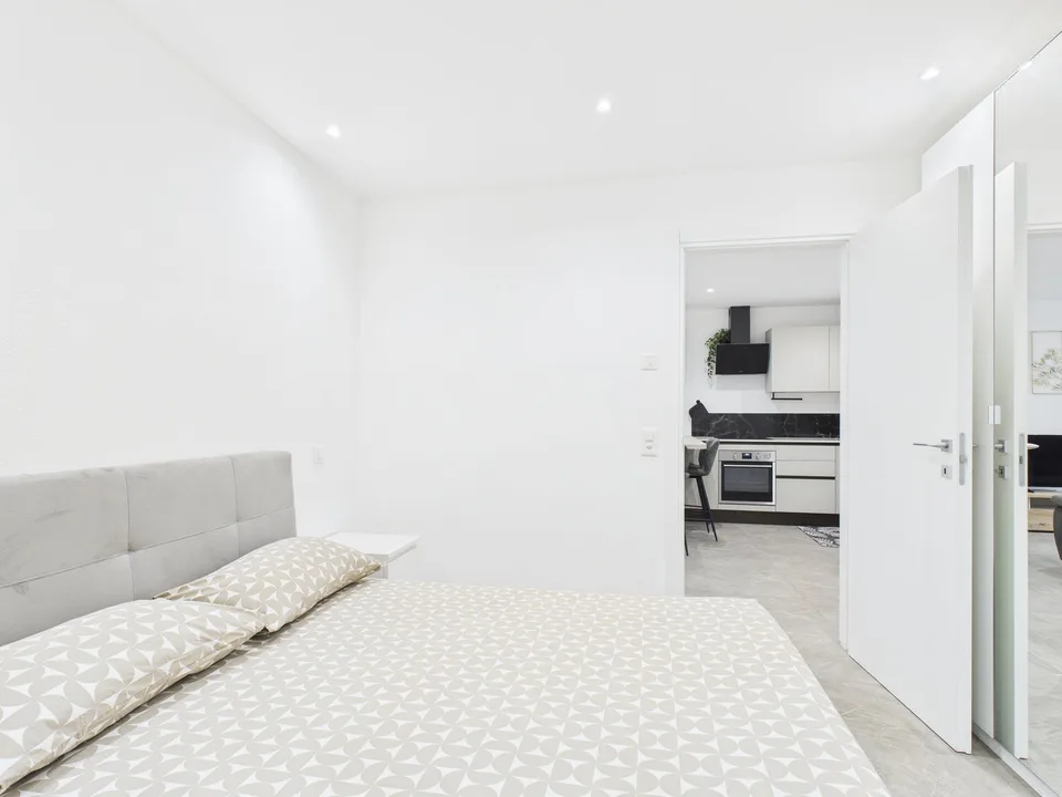 NUOVA COSTRUZIONE – 3,5 LOCALI CON GIARDINO E POSTO AUTO | IDEALE DA VIVERE O A REDDITO – Foto 13 von 18