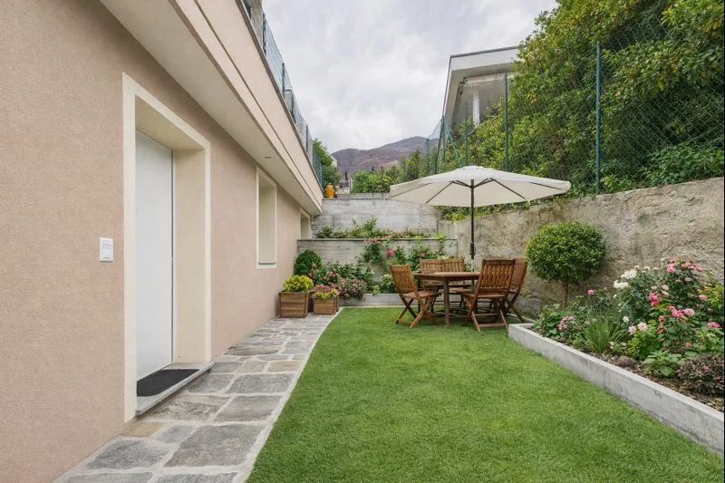 INVESTIMENTO IMMOBILIARE 4%: 3,5 LOCALI A REDDITO IN NUOVA COSTRUZIONE CON GIARDINO E POSTO AUTO