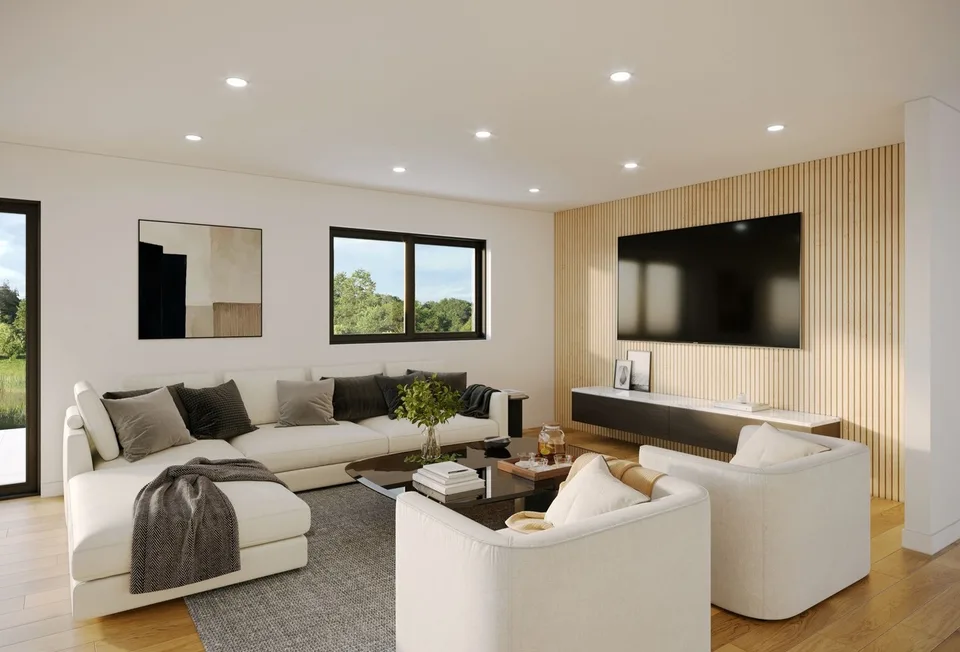 Neue Villa nach Plan in einem grünen Raum