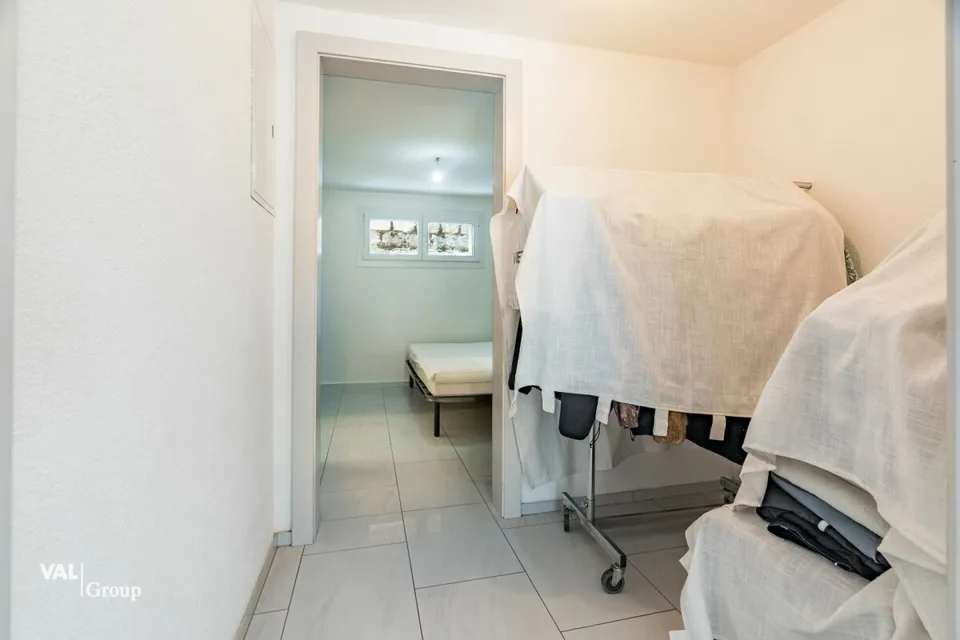 Maison spacieuse avec deux logements et terrain constructible – photo 24 sur 28