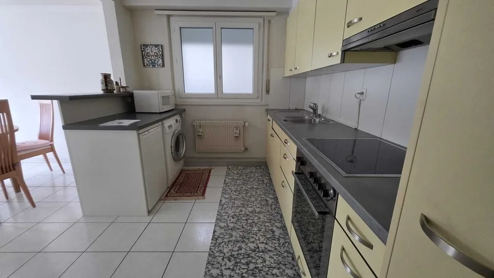 Appartement de 4 pièces au 1er étage avec ascenseur