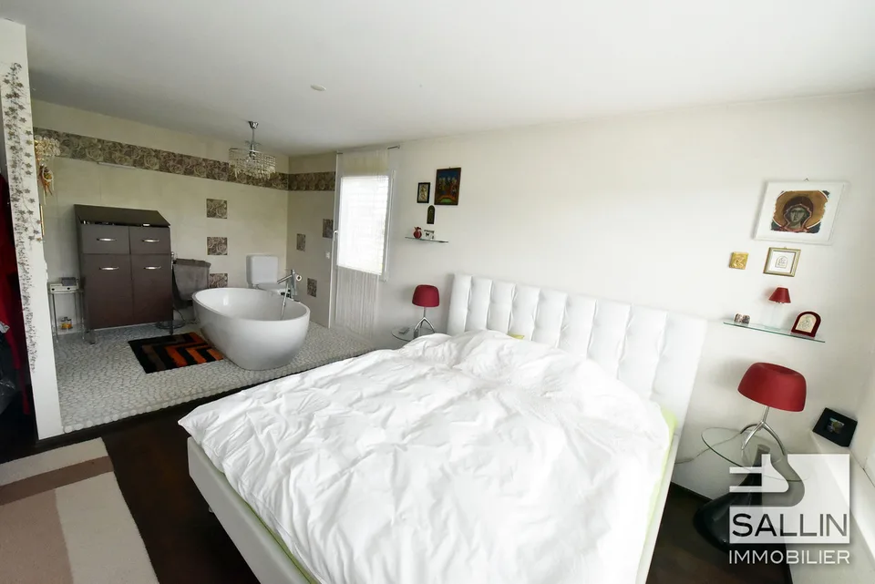 Ampia casa di 4½ locali con giardino e 2 posti auto esterni