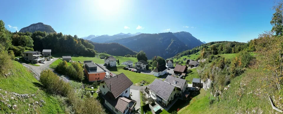 Terrain à bâtir au milieu de la nature sur une pente avec vue