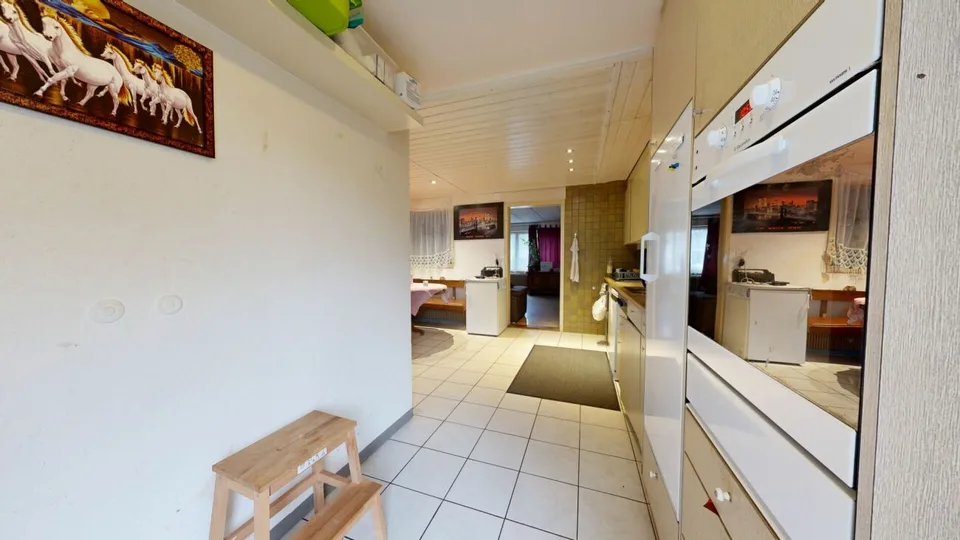 Maison à deux familles avec besoins de rénovation et parcelle de terrain constructible supplémentaire