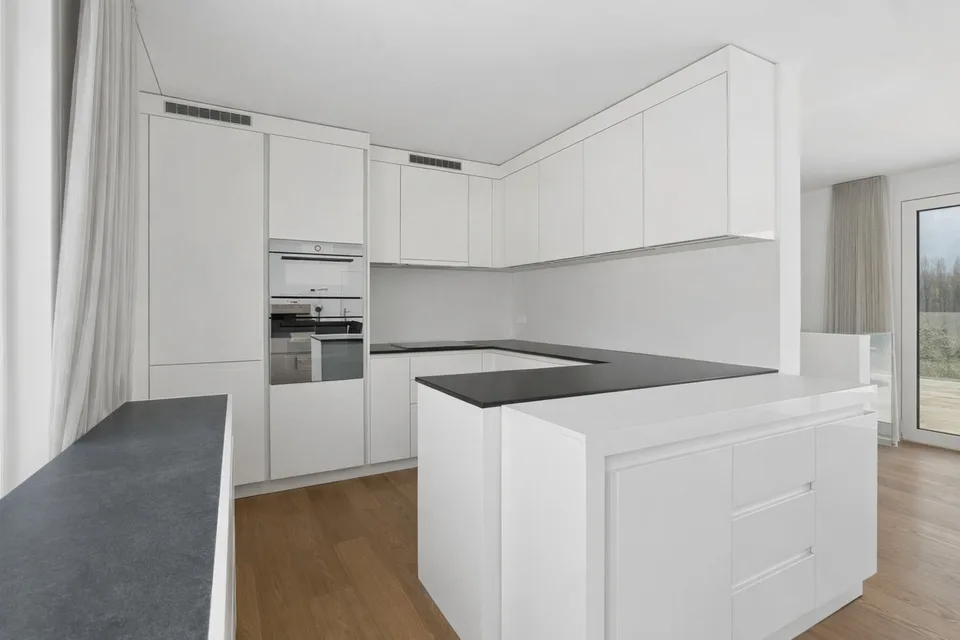 Attico-duplex con ampia terrazza a due passi dal Lido di Locarno – Foto 9 von 12