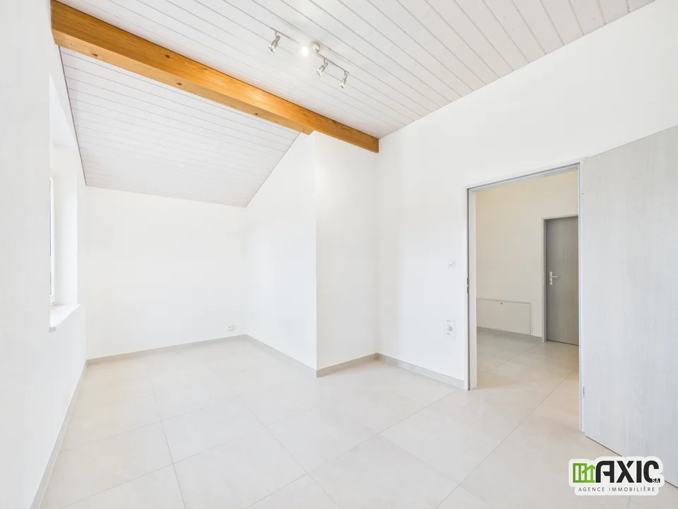 Spacieux duplex de 4 pièces en PPE au 2e étage à Alle