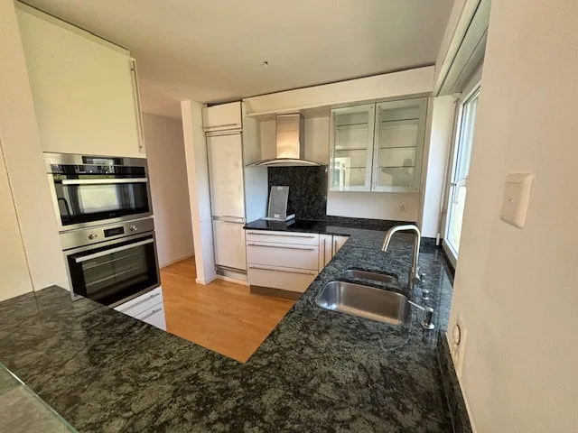 Helle 4.5-Zimmer-Wohnung im Erdgeschoss mit Wintergarten und Terrasse