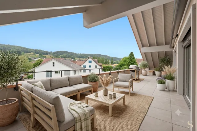 Erstbezug: exklusive Attika-Wohnung mit riesigem Balkon und Cheminée
