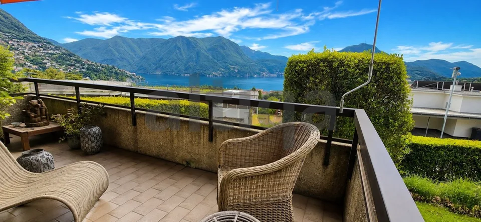 Esclusivo appartamento duplex con balcone e giardino a Massagno