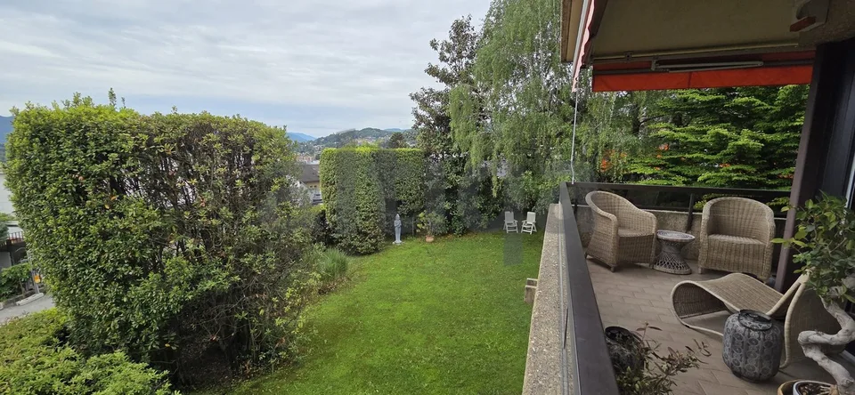 Esclusivo appartamento duplex con balcone e giardino a Massagno