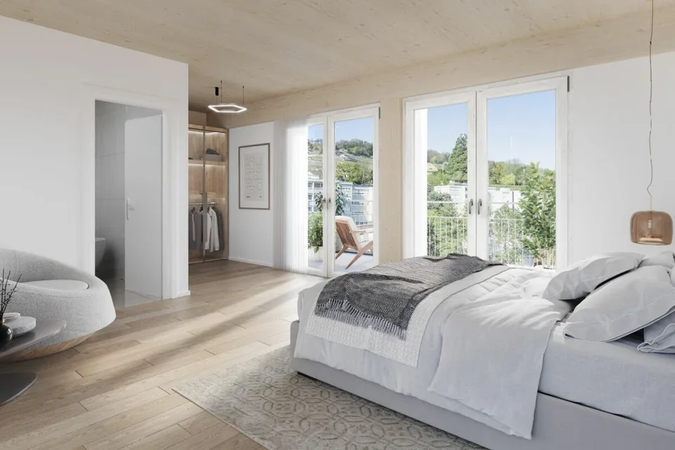 Ampio attico traversante di 4.5 locali con terrazze di 38.5 m²
