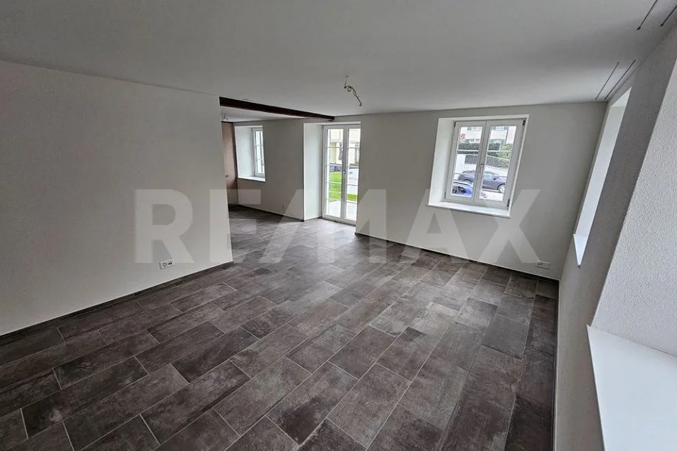 Casa a schiera di 5,5 locali pronta per essere occupata, situata in una zona residenziale centrale