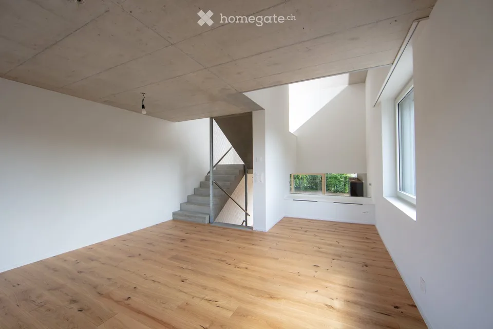 Casa a schiera moderna di 4,5 locali (casa d'angolo) con stile, comfort e grande giardino in affitto