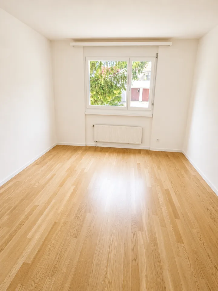 Appartamento luminoso 5.5 locali con ampio balcone e vista sul verde
