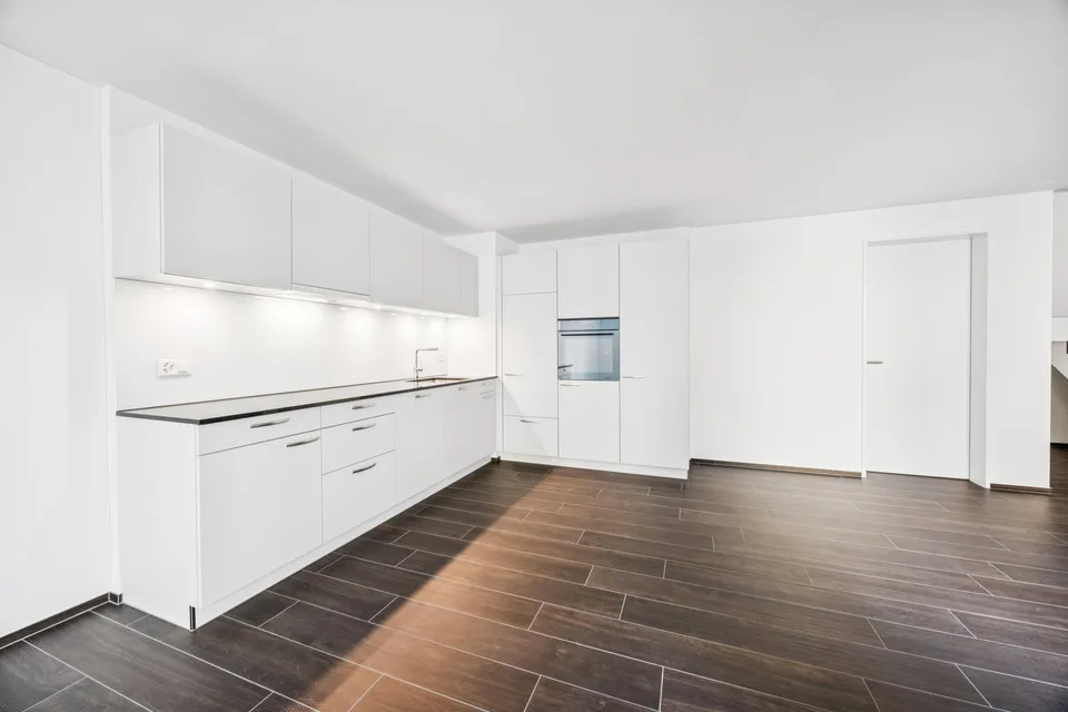 First Rental: Modern Split-Level Apartment with Charm in Zürich-Oerlikon