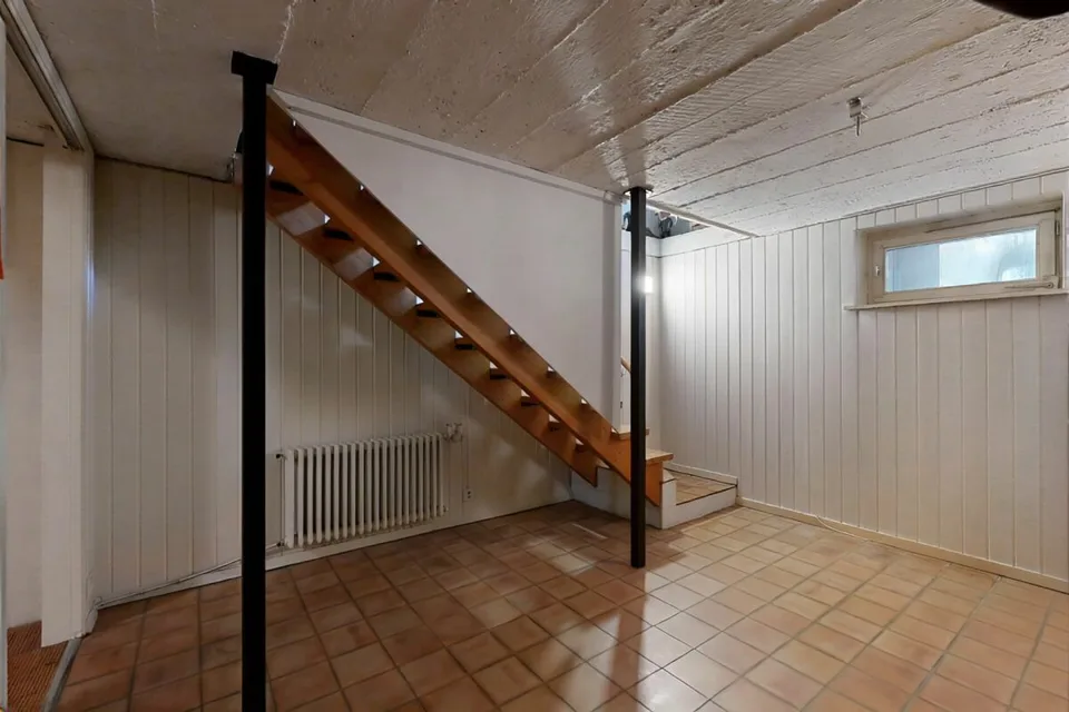 Maison multifamiliale entièrement louée avec 3 appartements et 2 garages – photo 14 sur 29