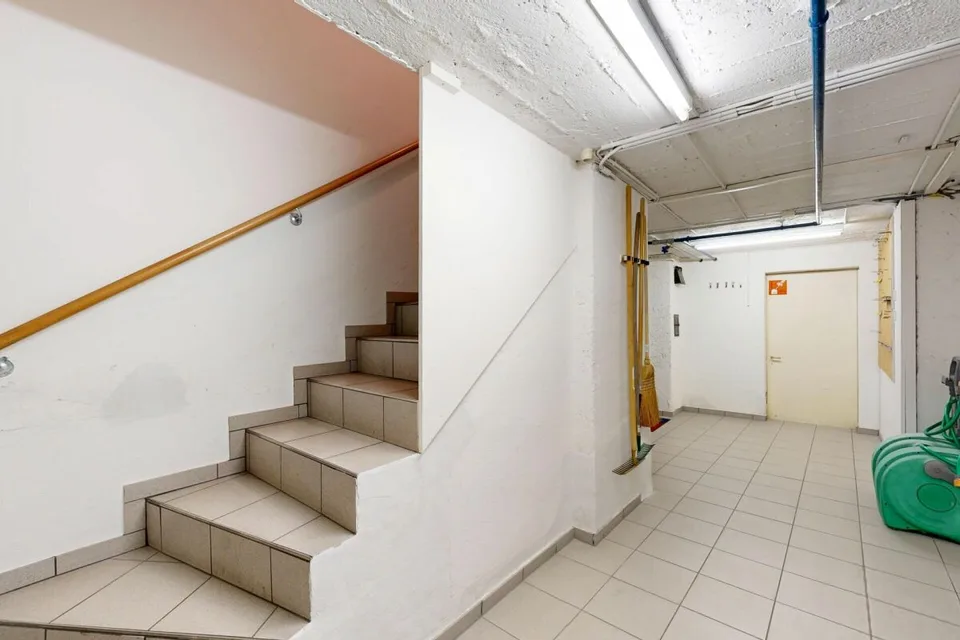 Maison multifamiliale entièrement louée avec 3 appartements et 2 garages – photo 27 sur 29