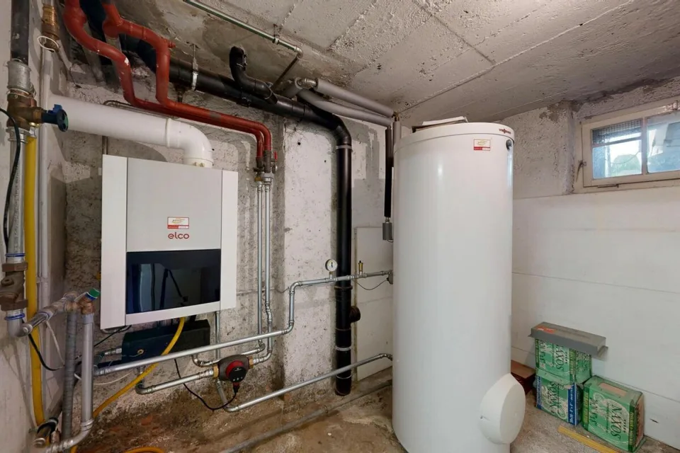 Maison multifamiliale entièrement louée avec 3 appartements et 2 garages – photo 28 sur 29
