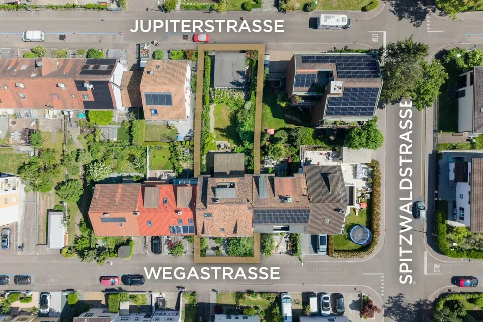 Maison multifamiliale entièrement louée avec 3 appartements et 2 garages