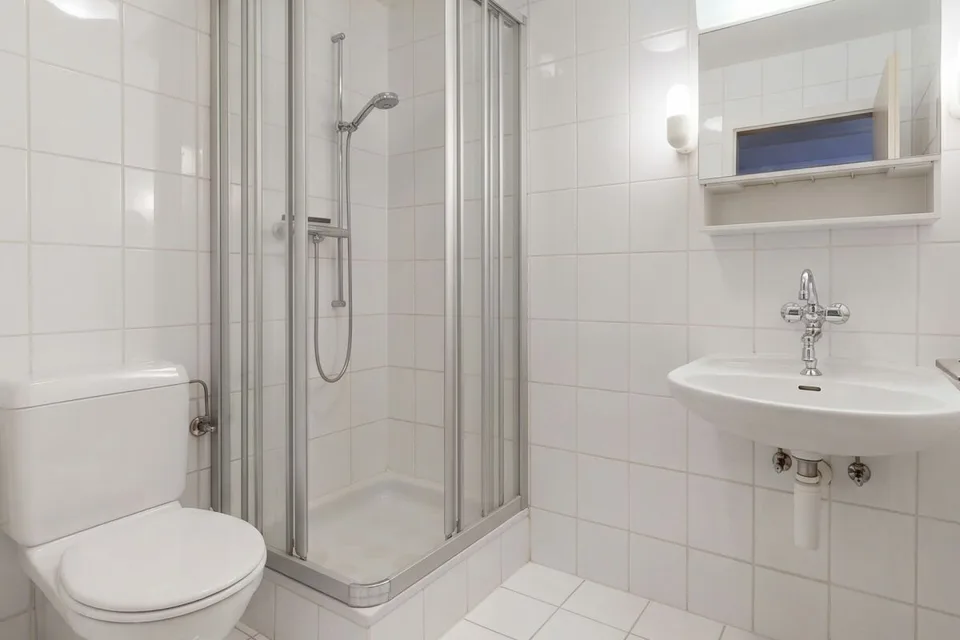 Maison multifamiliale entièrement louée avec 3 appartements et 2 garages – photo 11 sur 29