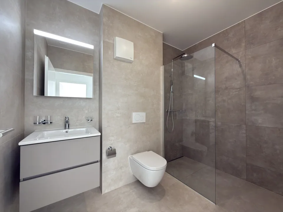 Appartamento nuovo di 4.5 locali a piano terra con terrazza privata – foto 7 di 11