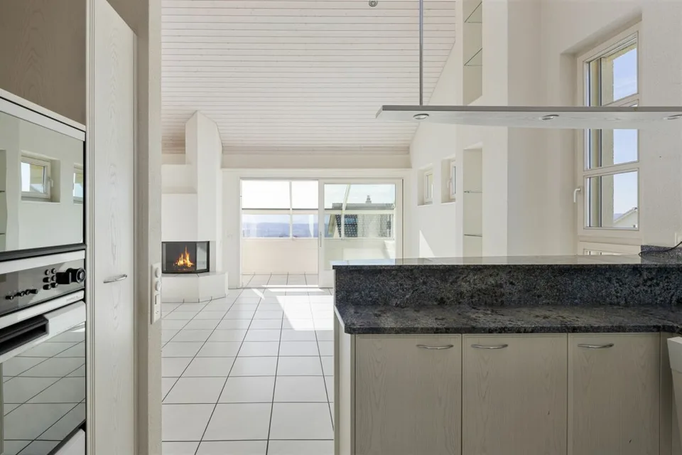 Appartamento maisonnette 4,5 locali con vista sulle Alpi e ufficio/stanza hobby separata