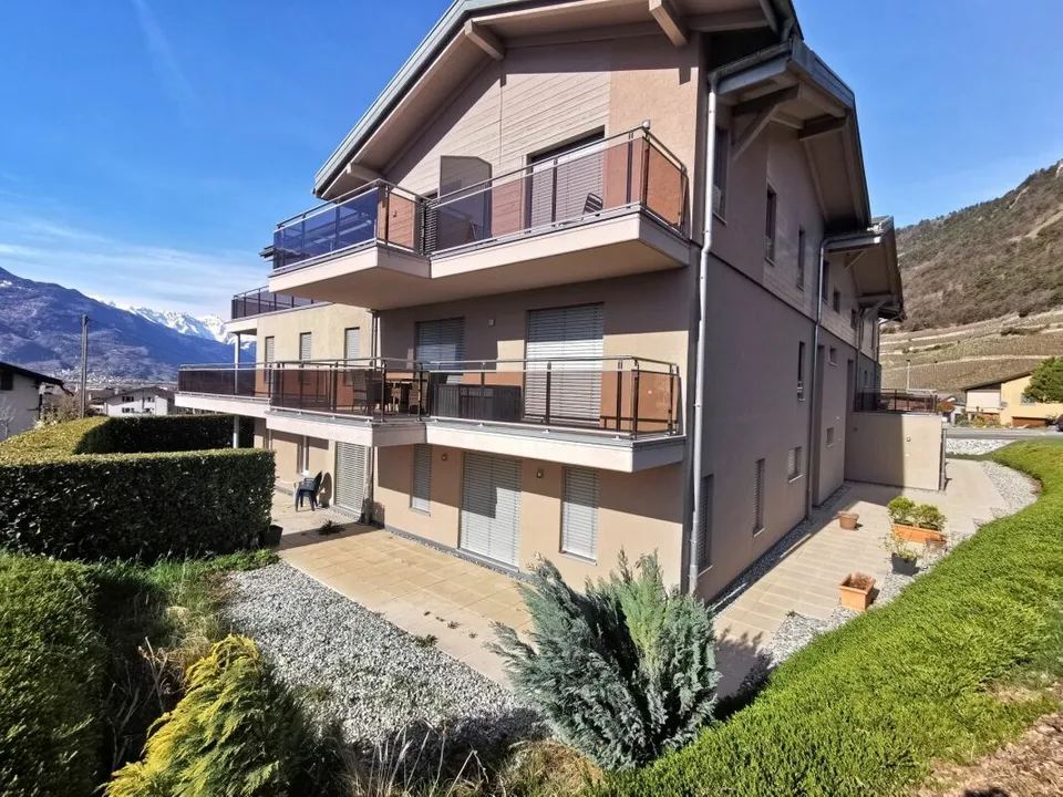 Appartamento di 2,5 locali con giardino in edificio residenziale