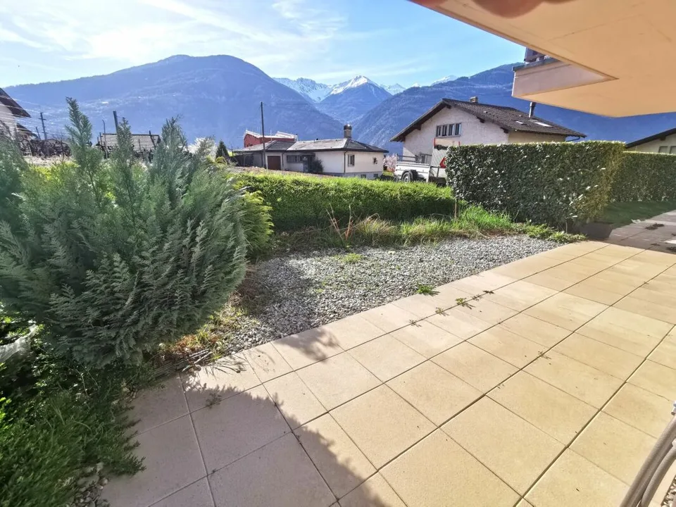 Appartement 2.5 pièces avec jardin dans immeuble résidentiel