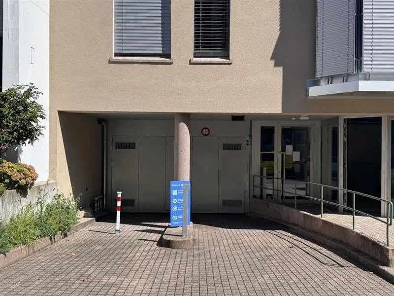 Parking space with charging possibility
