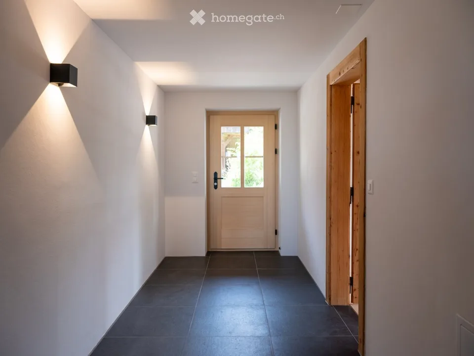 Nuovo appartamento moderno 2,5 locali con charme in una fattoria al piano terra