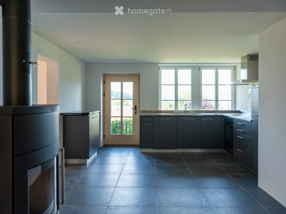 Nuovo appartamento moderno 2,5 locali con charme in una fattoria al piano terra