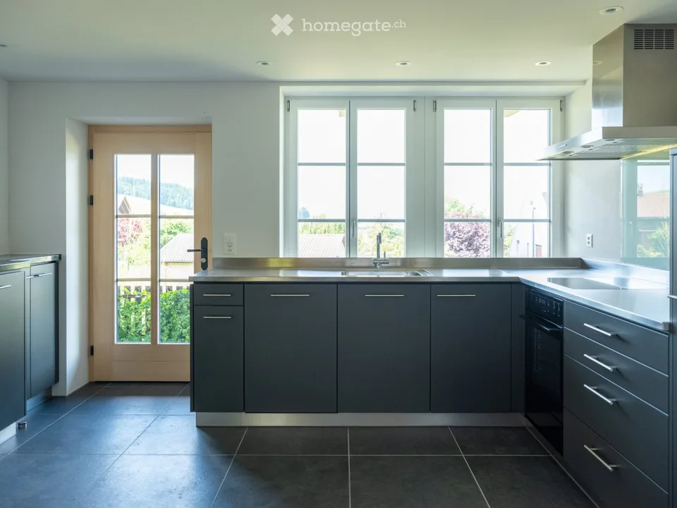 Nuovo appartamento moderno 2,5 locali con charme in una fattoria al piano terra