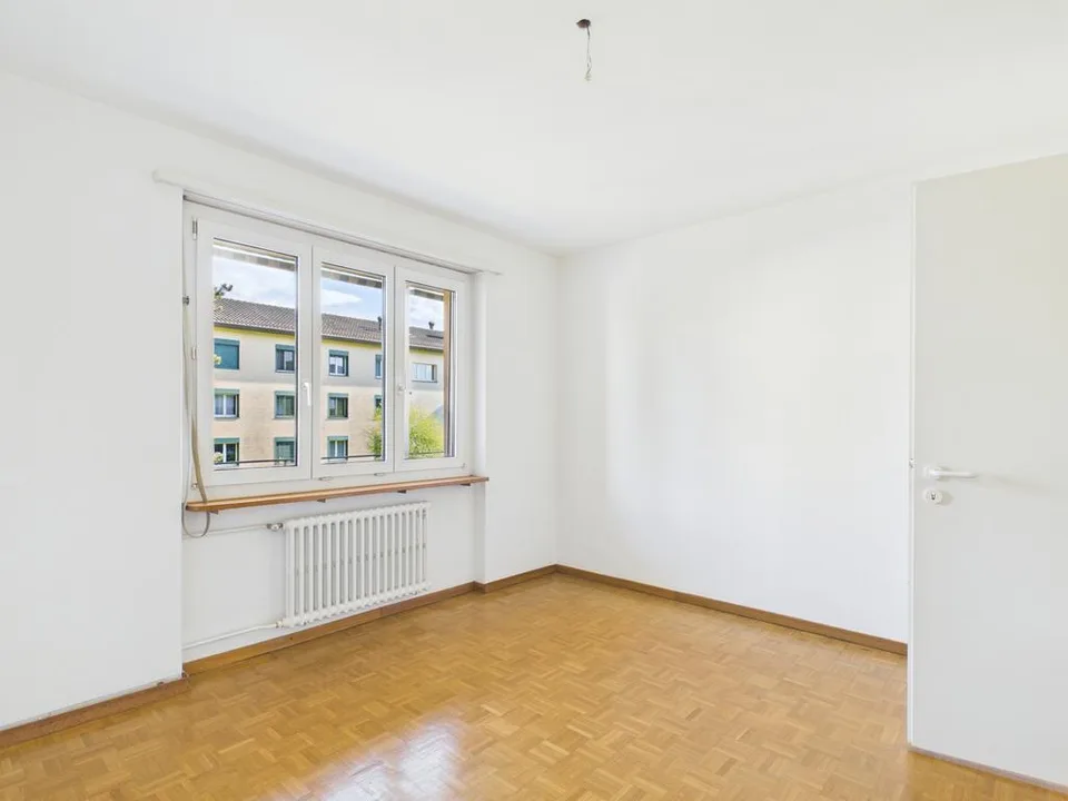 Charmant appartement 2 pièces avec balcon à Zürich-Witikon