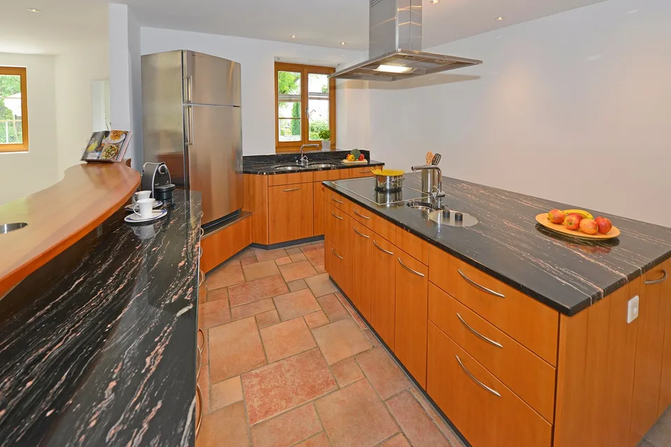 Appartamento a maisonnette di 4,5 locali con giardino