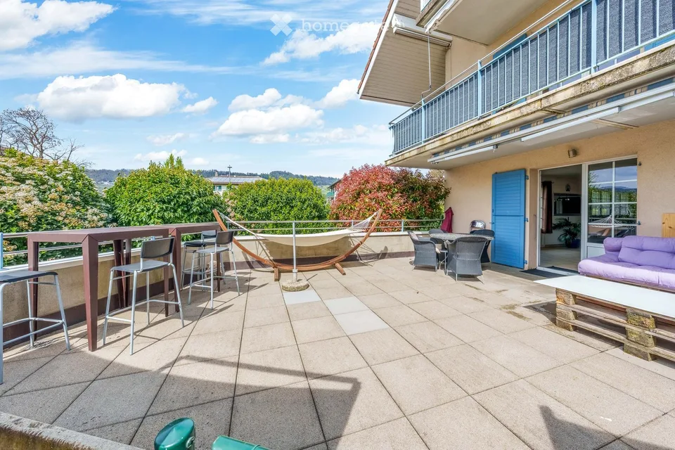 Magnifique appartement de 5,5 pièces à Perroy avec terrasse et jardin