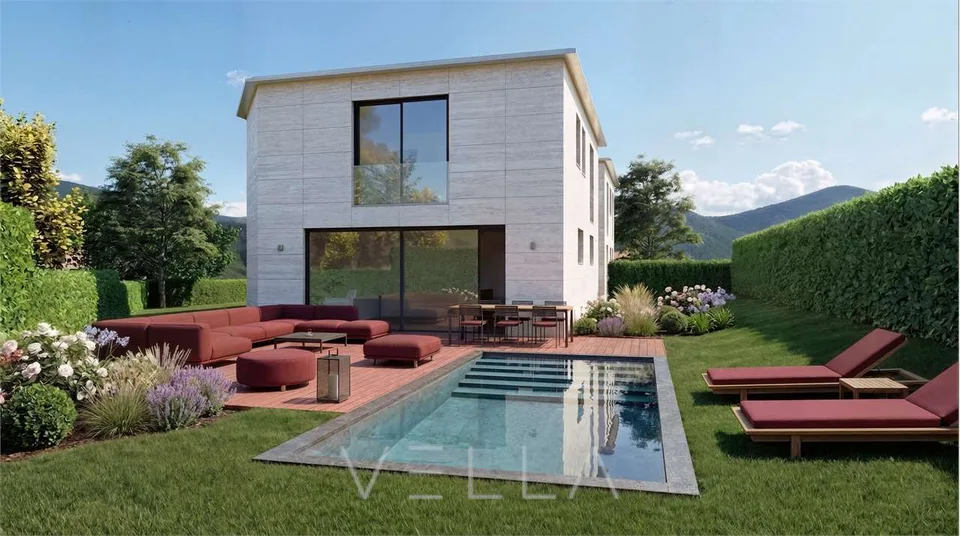 Nuova proprietà in Collina d'Oro: una villa con piscina e due appartam