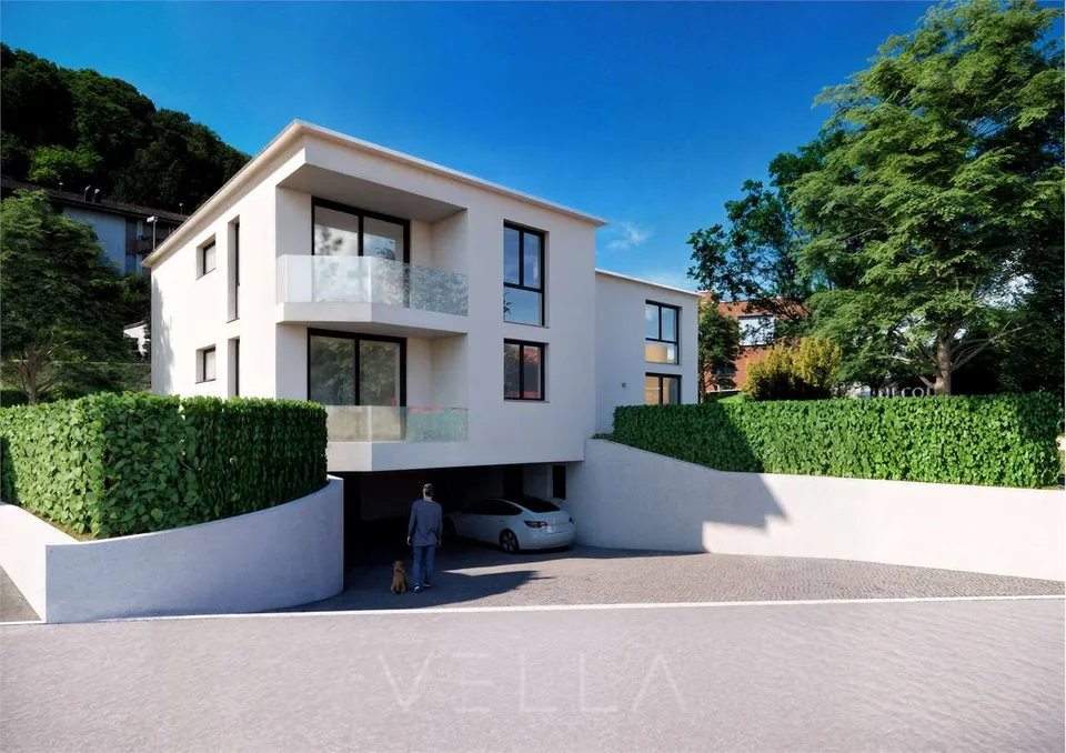 Nuova proprietà in Collina d'Oro: una villa con piscina e due appartam