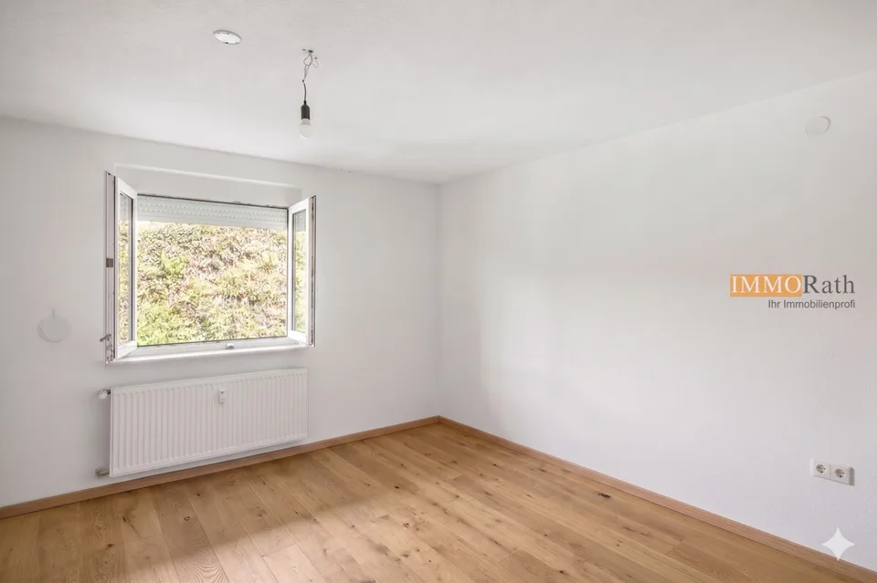 IMMORath.de - Maison multifamiliale rénovée avec trois unités de logement énergétiquement efficaces – photo 10 sur 13