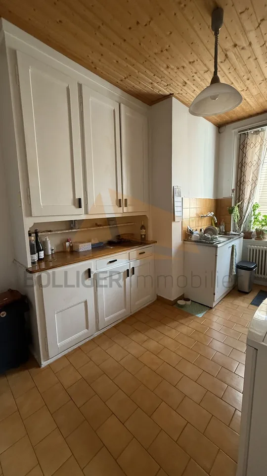 Zu verkaufen Charmantes Apartment mit 2,5 Zimmern im 1. Stock