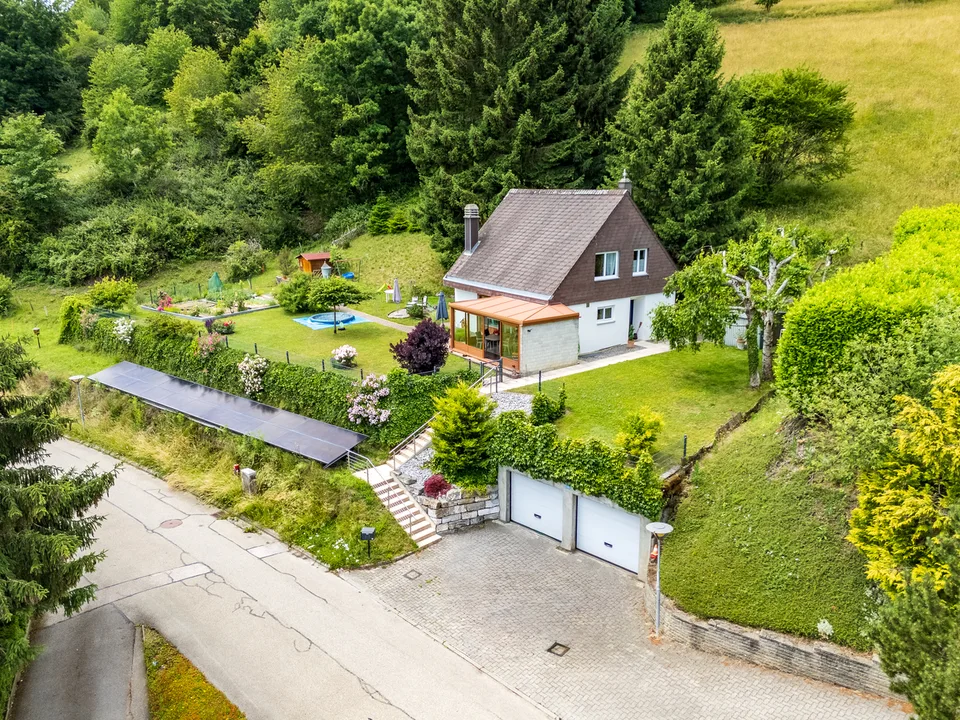 Superbe villa familiale de 5.5 pièces avec grand jardin et vue dégagée
