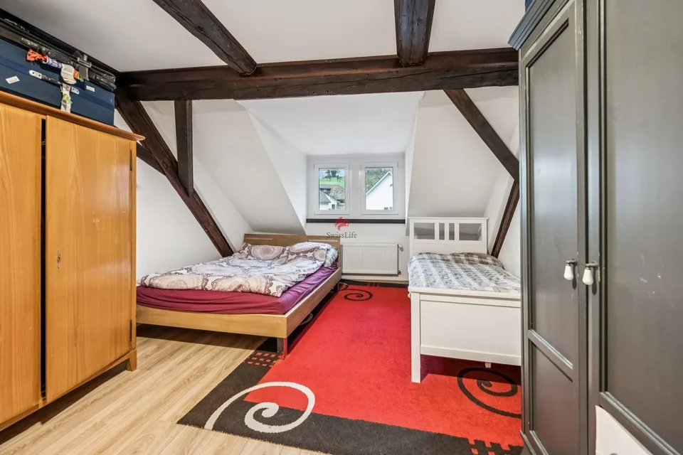 Casa multifamiliare attraente con redditi locativi stabili – foto 8 di 10