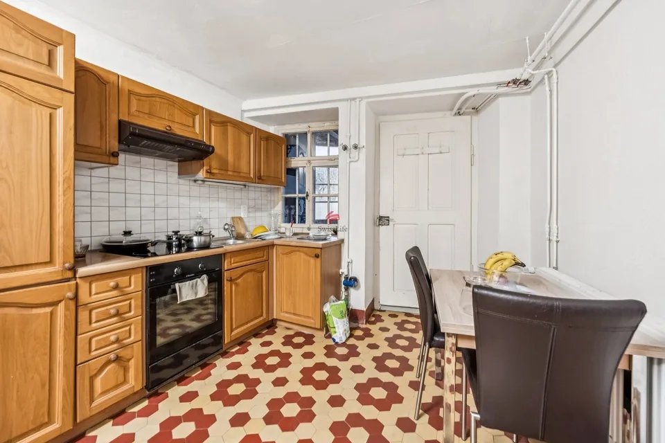 Casa multifamiliare attraente con redditi locativi stabili – foto 10 di 10