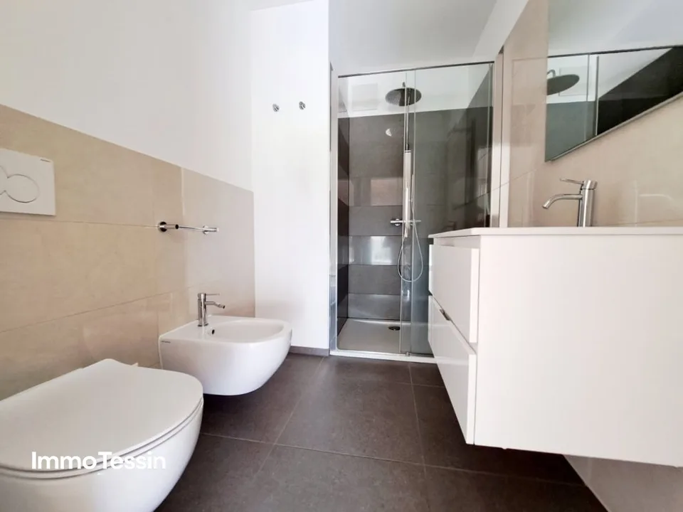 Exklusive & neuwertige Wohnung nahe Lugano und dem Lago die Lugano mit freier Sicht in die Tessiner Bergwelt – Foto 11 von 13
