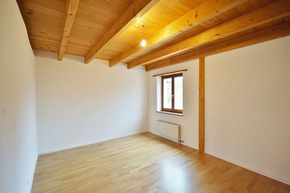 Charmante Dachgeschosswohnung mit Gartenanteil