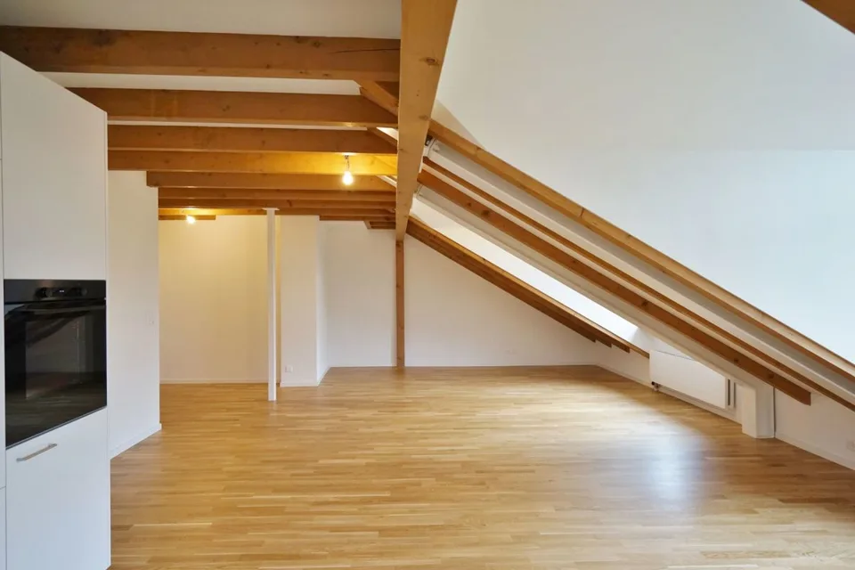 Charmante Dachgeschosswohnung mit Gartenanteil