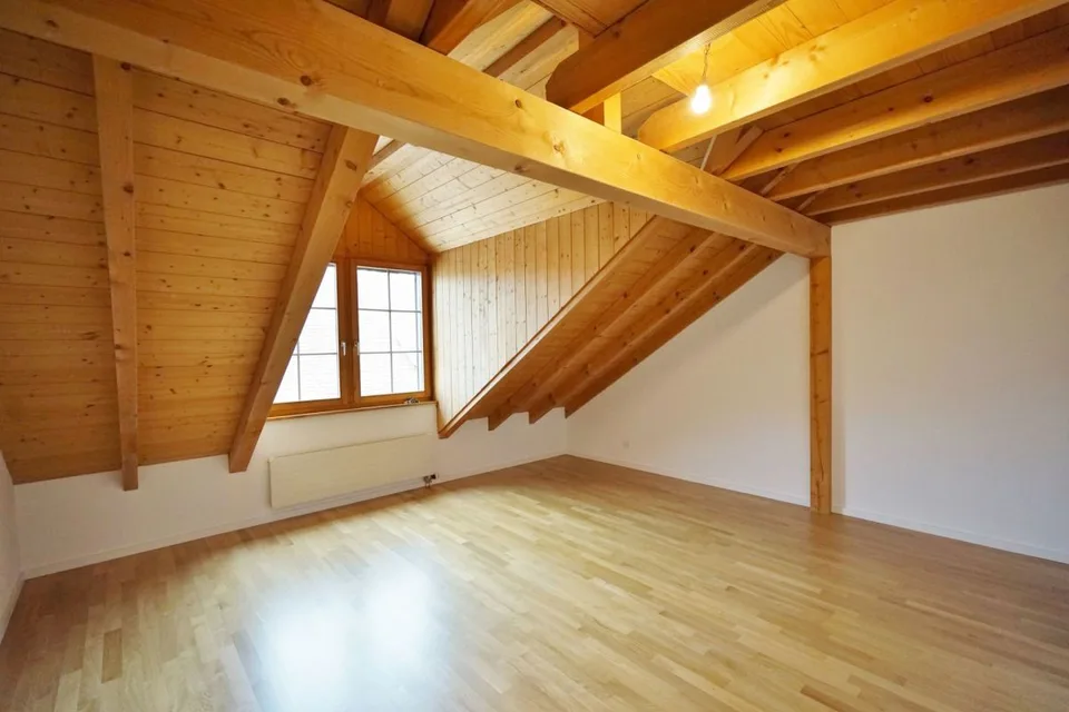 Charmante Dachgeschosswohnung mit Gartenanteil
