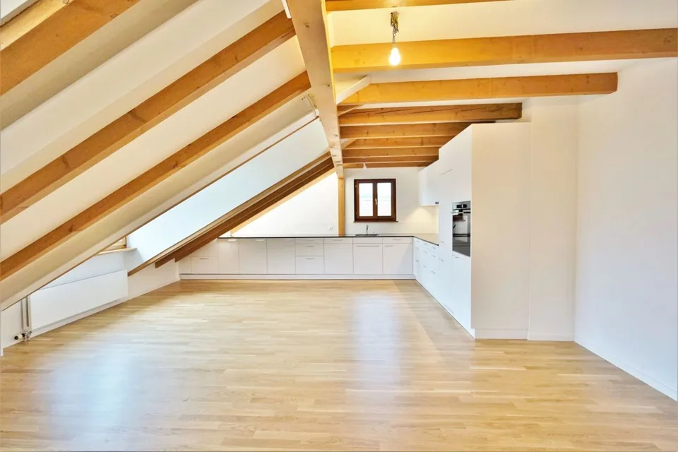 Charmante Dachgeschosswohnung mit Gartenanteil