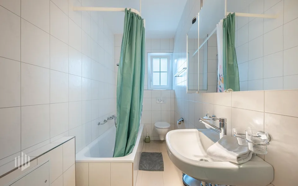 ImmoWyss - Attraktives Mehrfamilienhaus mit Geschäftsräumlichkeiten – Foto 7 von 13