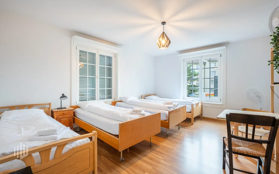 ImmoWyss - Attraktives Mehrfamilienhaus mit Geschäftsräumlichkeiten – Foto 10 von 13