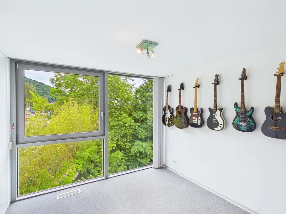 Exclusive Triplex Apartment with Direct Lake Access and Private Boat Dock in Twann-Tüscherz